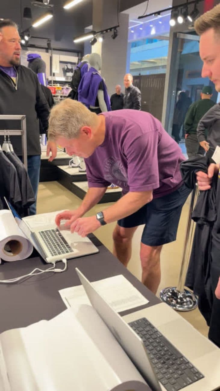 Adidas retail activation: staff personalizing championship shirts live in store