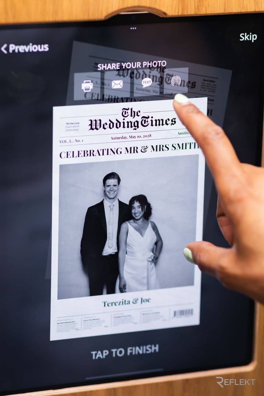 Vintage newspaper photo booth screen showing a couple on a front page
